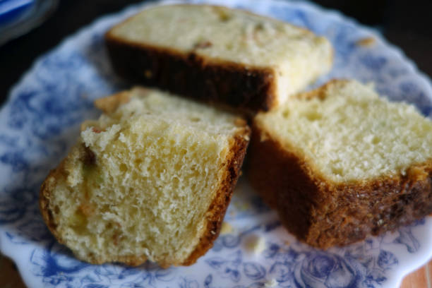 istock Pieces of cake on plate with blur effect. 1153713447