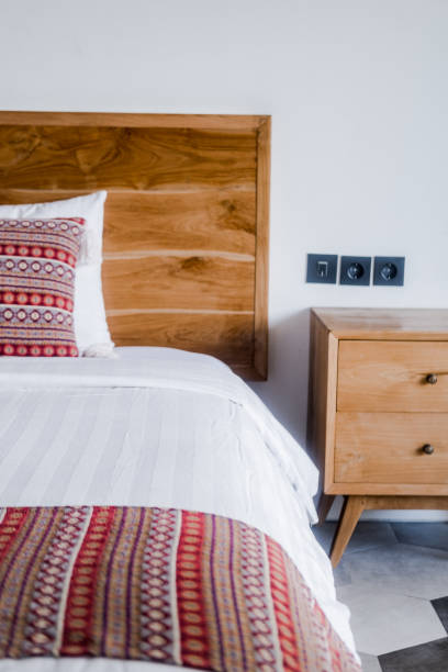 istock Bedroom interior, light wooden bedhead 1153714337