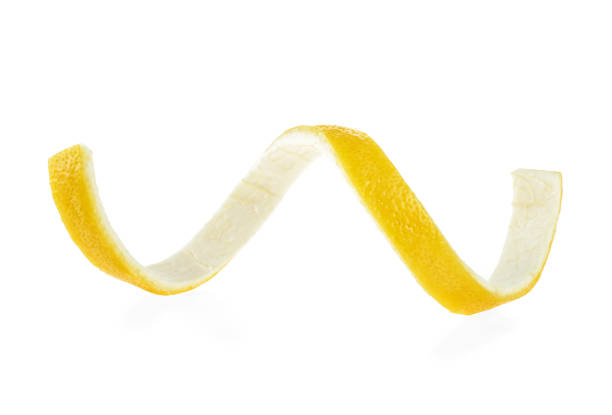 istock Lemon twist on a white background. Lemon peel. 1153714458