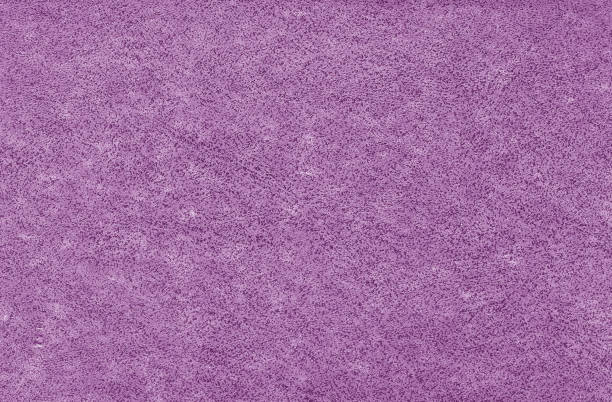 istock Old grungy canvas pattern with dirty spots in purple color. 1153715776