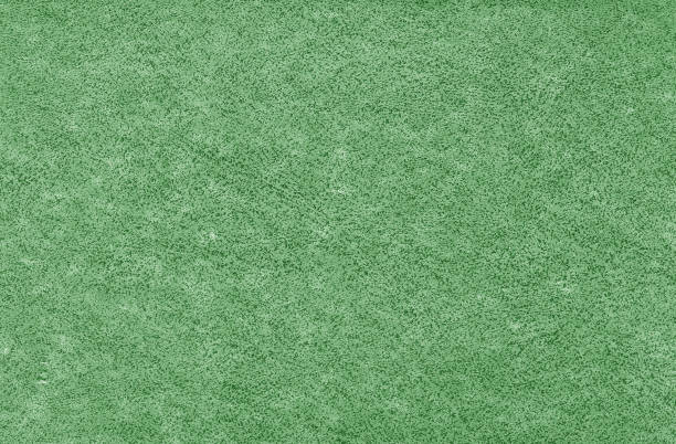 istock Old grungy canvas pattern with dirty spots in green color. 1153716109
