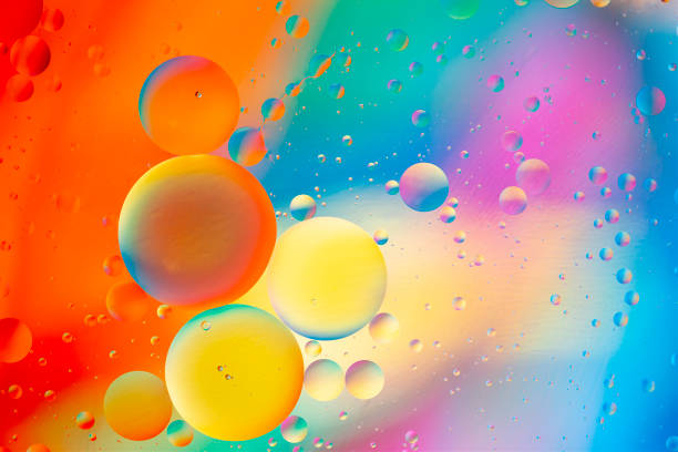 Colored Oil Drops on Water