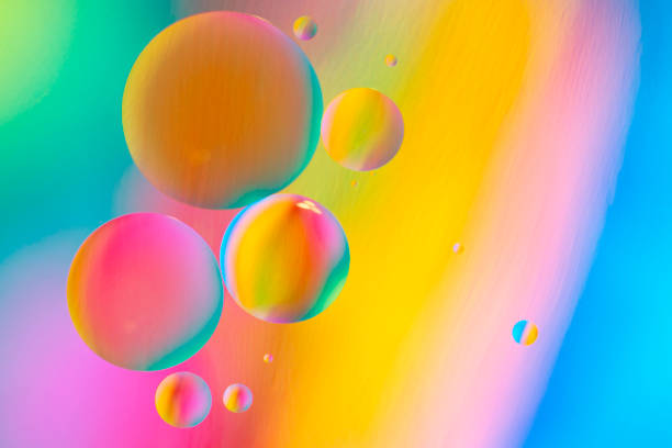 istock Colored Oil Drops on Water 1153722692