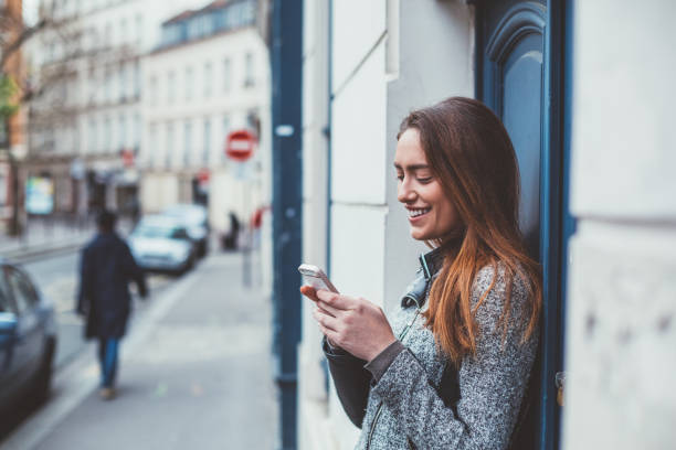 istock Happy woman using phone 1153725656