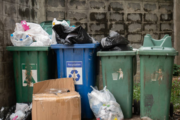 istock dirty full public rubbish bins 1153726281