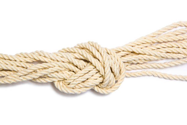 istock Braided rope souvenir on white background 1153726983