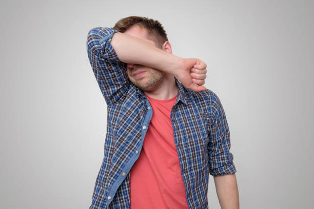 istock Feeling depressed. Man covering face with hand 1153733307
