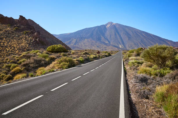 istock Scenic road with Mount Teide in background, Tenerife, Spain. 1153736731