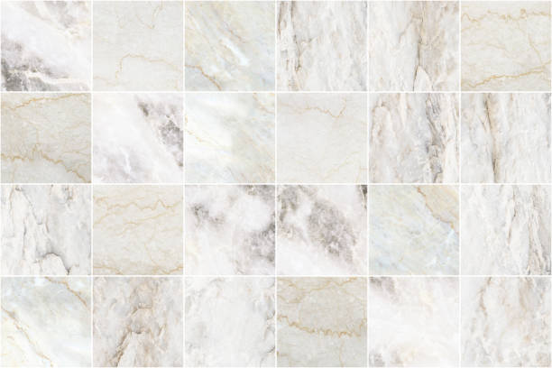 istock White and grey marble mosaic wall tile texture background. Big square marble tile with natural pattern. 1153736809