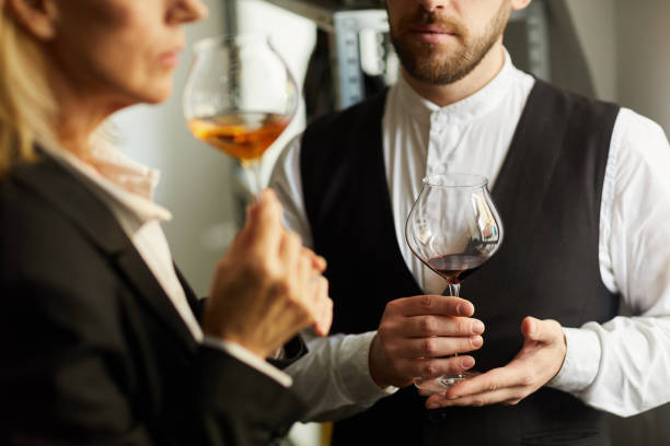 istock Two Sommeliers Closeup 1153742443