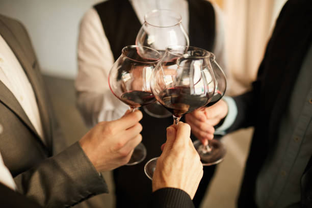 istock Business people Drinking Wine Closeup 1153742480