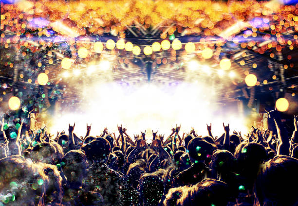 istock Concert crowd in front of a live stage 1153742647