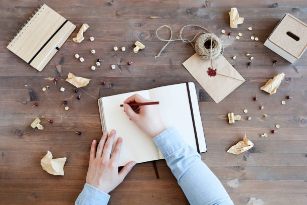 istock Mess on desk of creative director 1153742739
