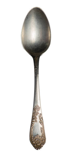 istock spoon isolated on white background. metal spoon. vintage spoon. 1153744489