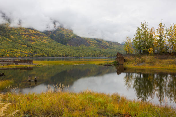 istock Colorful Autumn Lake Scene 1153747110