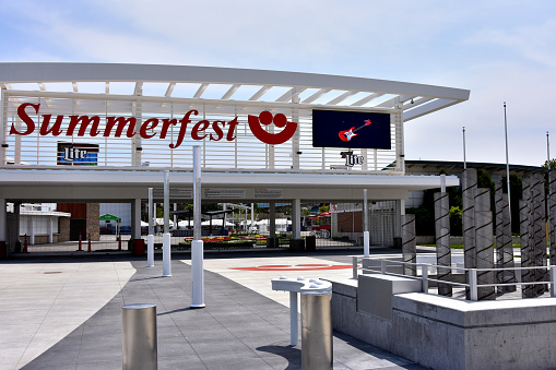 Milwaukee, Wisconsin / USA - June 3, 2019: The Summerfest main entrance with guitar on large monitor.