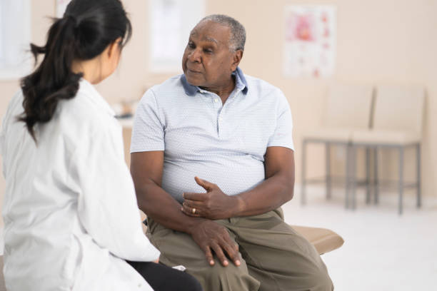 istock Senior man talking to doctor 1153753587