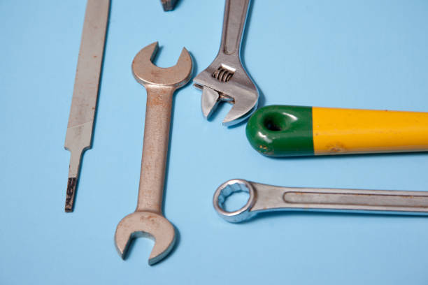 istock Close view of a metal file and wrenches 1153756732