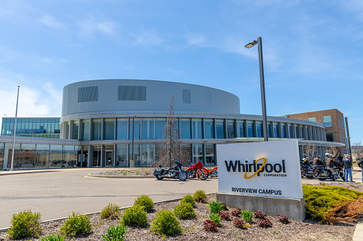 Benton Harbor, Michigan, USA - May 4, 2019: The Whirlpool Corporation Reverview Campus, with bikers in the parking lot