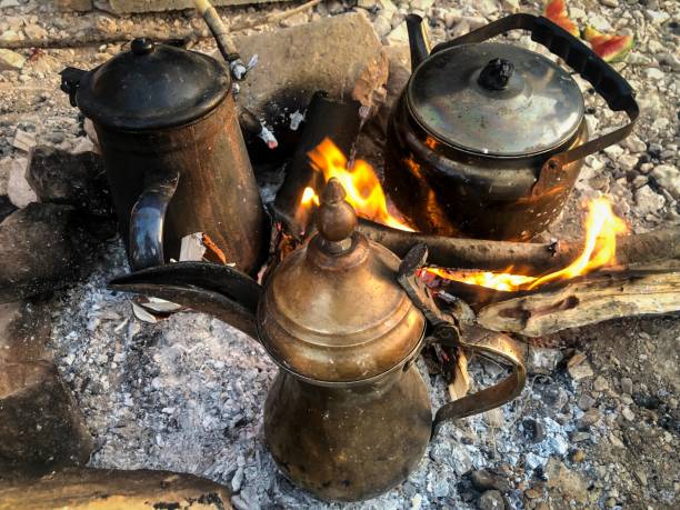 istock Bedouin tea and coffee on the fire 1153758111