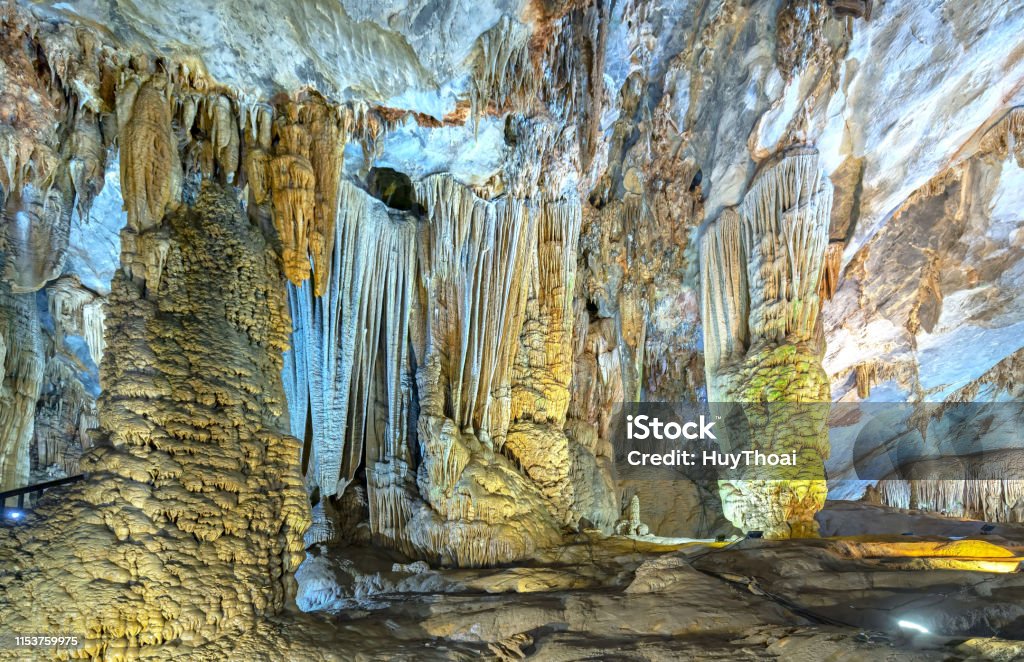 Cave-shaped limestone geological formations with beautiful stalactites and stalagmites Cave-shaped limestone geological formations with beautiful stalactites and stalagmites create spectacular features in the natural world Phong Nha-Kẻ Bàng National Park Stock Photo