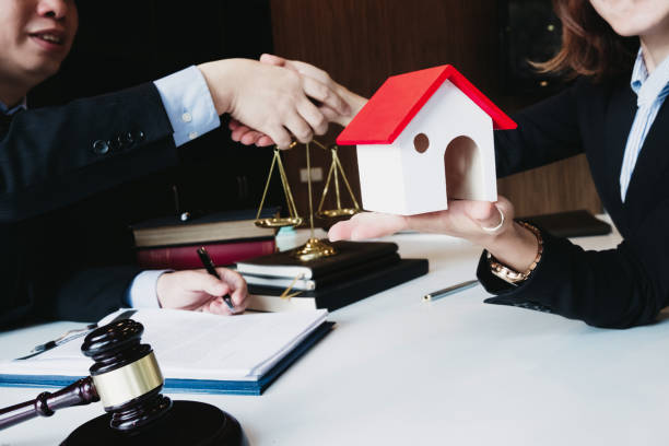 istock smart lawyer handshake with advice in the office before considering the judgment, lawyer concept