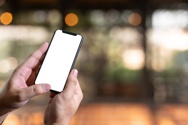 istock Close up man hands using smart phone Technology and phone technology trends 1153764190