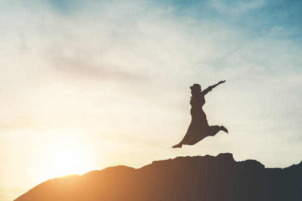istock Silhouette of people happy time 1153767709