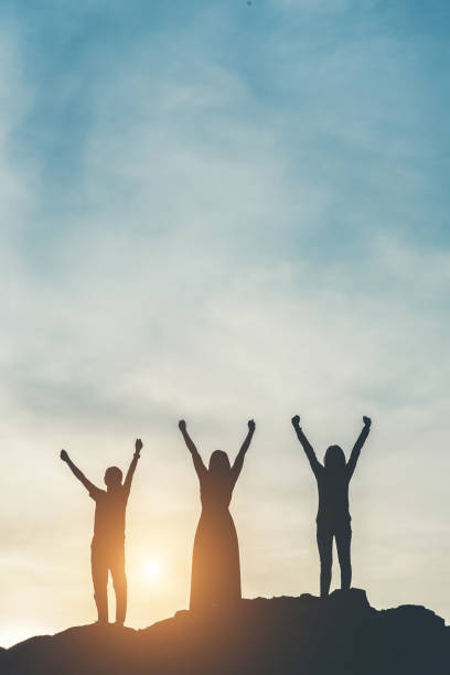 istock Silhouette of people happy time 1153767741