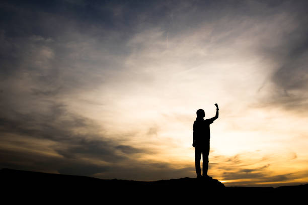 istock Silhouette of people happy time 1153767863