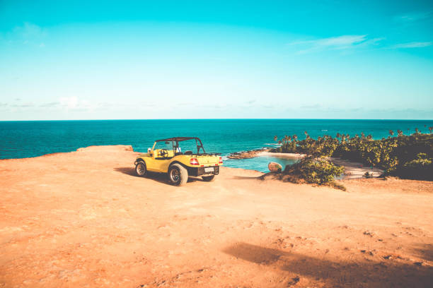 Beautiful landscape buggy on top of a cliff. Buggy on seashore in Coqueirinho's beach
