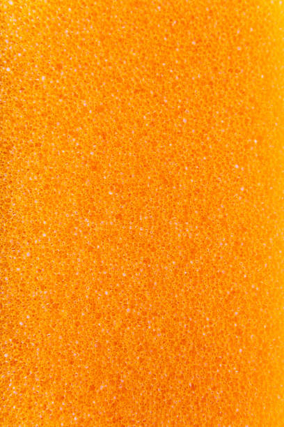 istock Orange background texture of the foam. Orange foam. 1153770807
