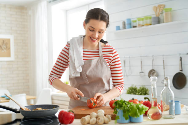 istock woman is preparing proper meal 1153773394
