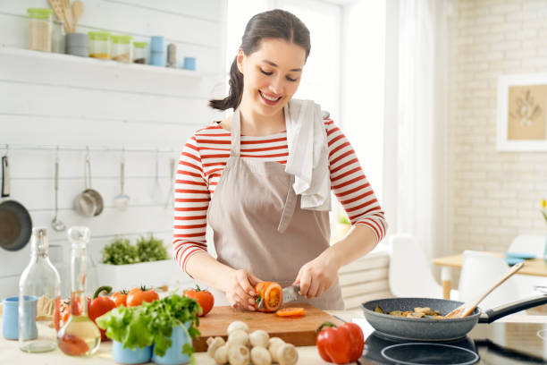 istock woman is preparing proper meal 1153773415