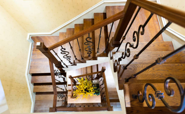 istock Modern spiral staircase in a  luxury home 1153773421