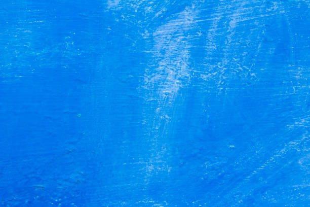 istock background texture blue paint with stains and popping in some places 1153775709