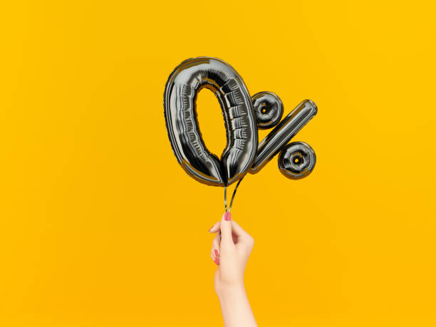 Female hand holding Zero percent symbol. Female hand holding Zero percent symbol. 0 % banner black flying foil balloons on yellow. 3d rendering. zero photos stock pictures, royalty-free photos & images
