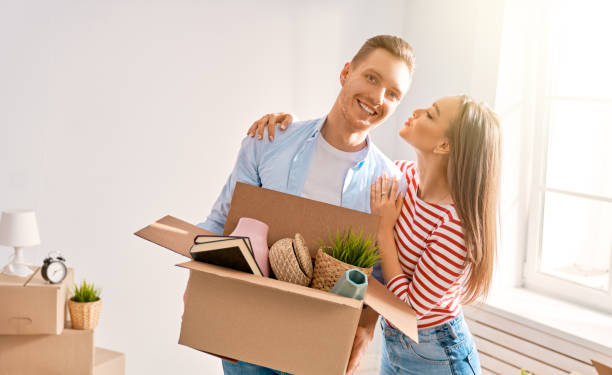 istock couple moving to new apartment 1153777471