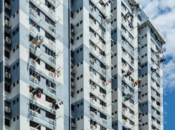 SINGAPORE-30 JUN 2017:HDB residential building facade with hanger,HDB building  is managed by the Housing and Development Board (HDB) under temporary leaseholds for 99 years only. The majority of the residential housing developments in Singapore are publicly governed and developed.