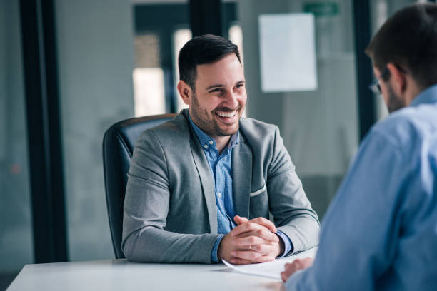 istock Successful businessman on a meeting. 1153779595