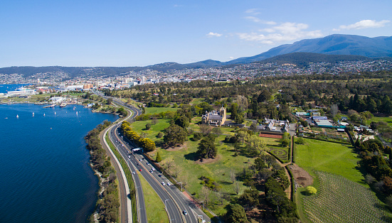 Aerial view of Hobart's Derwent River facing CBD, including Government House and Macquarie Point