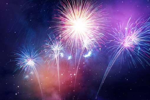 colorful fireworks on the night sky background.