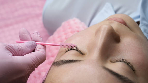 istock Eyelash Extension Procedure. Woman Eye with Long Eyelashes 1153785822