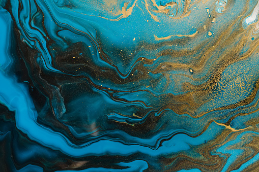 Acrylic Fluid Art. Blue aquamarine waves and gold inclusion. Abstract marble background or texture.