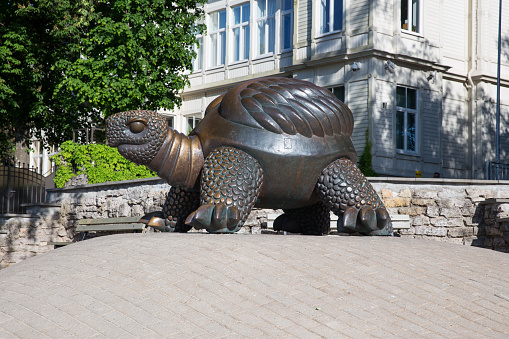 City Jurmala, Latvian Republic. Turtle sculpture with house view. Jurmala tourism place. Travel photo. 2019. 4. Jun