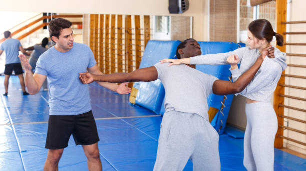 istock People fighting with coach at gym 1153793772