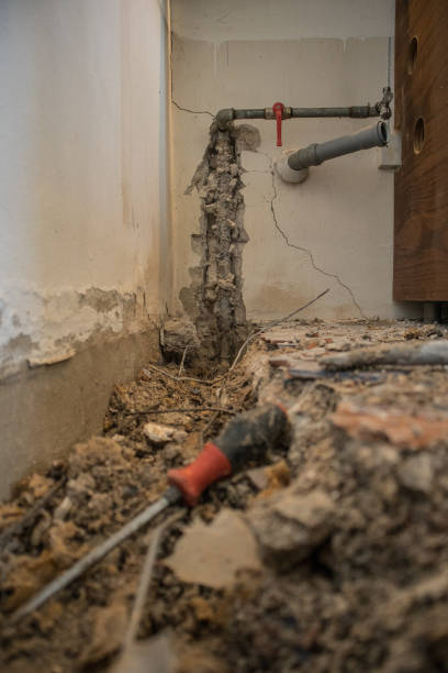 istock Hole with a water pipe in the ground 1153794641