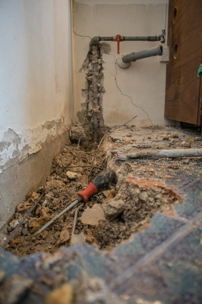 istock Hole with a water pipe in the ground 1153794647