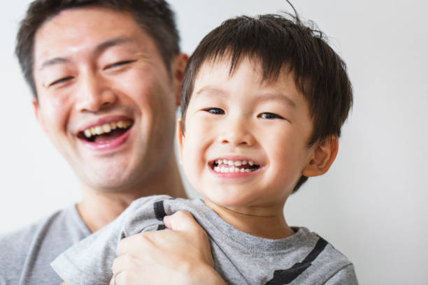 istock Father and son relaxed at home 1153794958