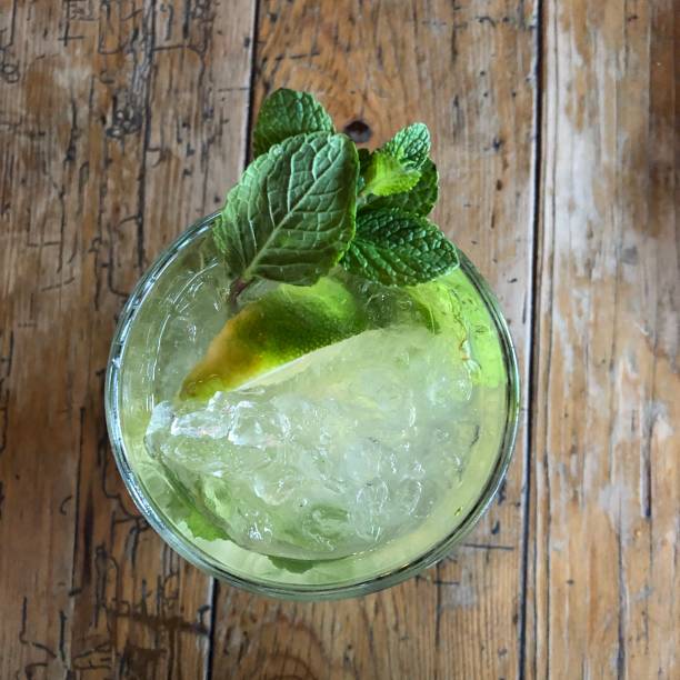 istock Mojito on a wooden table 1153796137